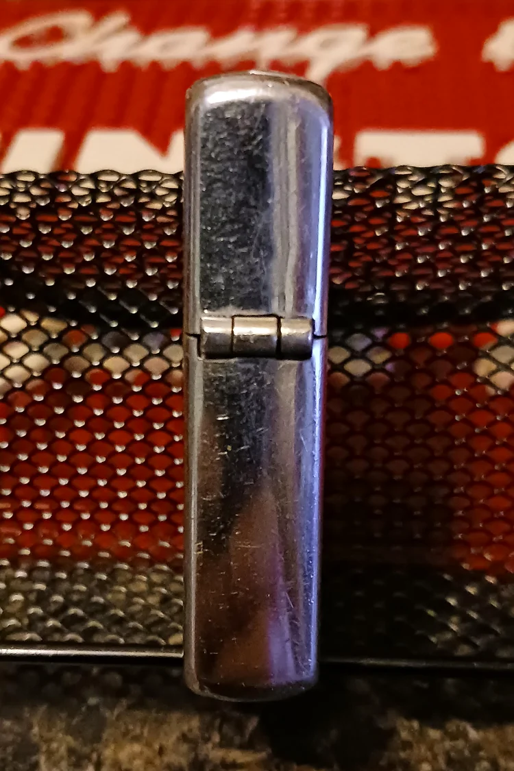 Zippo · 1948 — 3-barrel hinge